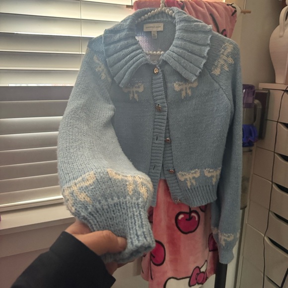 Sincerely Jules| Blue Cardigan Sweater with bows and gold button look. - Picture 3 of 5